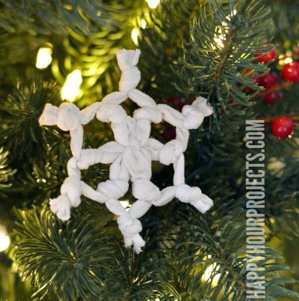 A snowflake-shaped ornament made from an upcycled t-shirt.