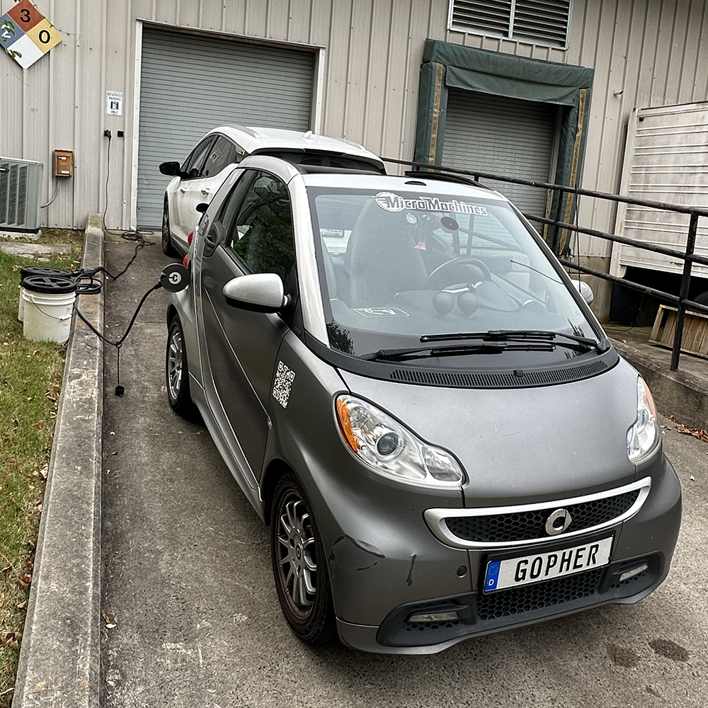 image of electric car charging at our facility's charging stations