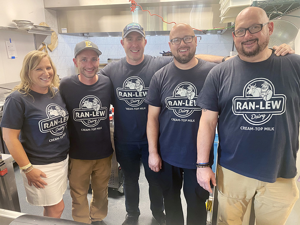 Harvest Table and Aramark chefs at fundraiser for Ran-Lew Dairy, wearing TS Designs printed shirts.