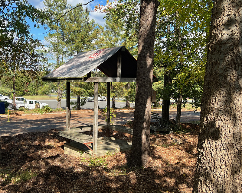 image of employee sitting area, roof made from recycled vinyl billboard.